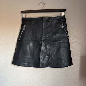 Love by Design L Faux Leather Skirt w/ zip accents.